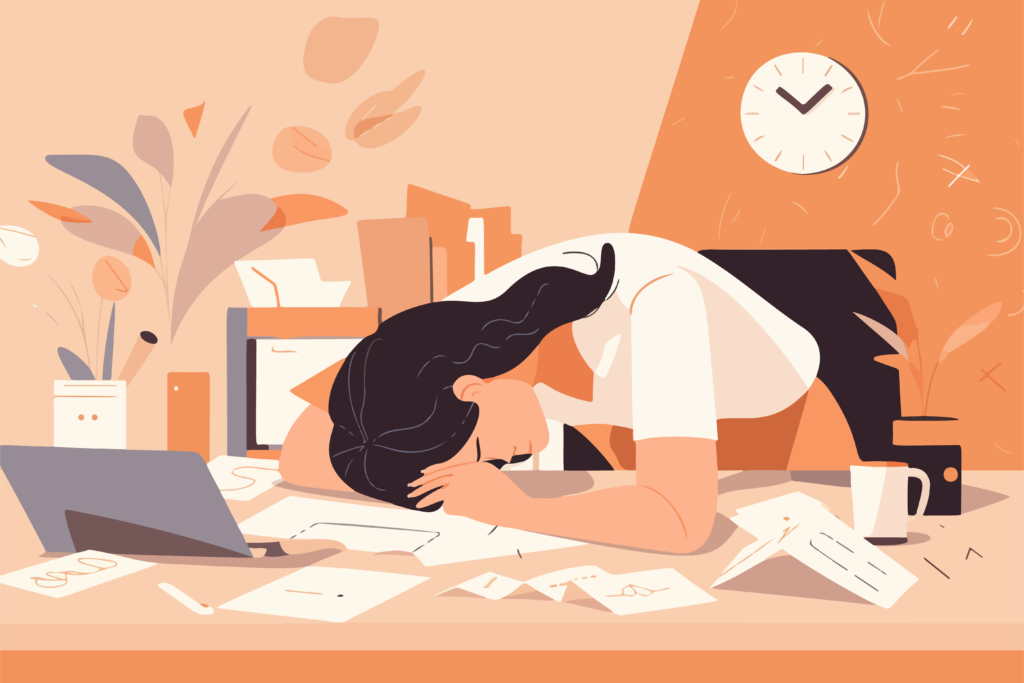A woman is sitting at a desk with a lot of papers on it.